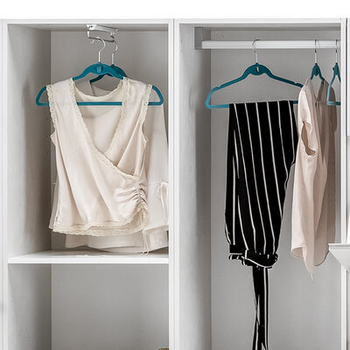 Tall unit with extractable cloths hanger