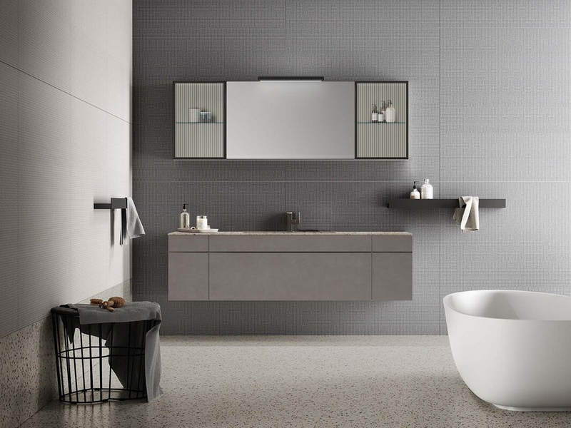 Composition in grafite concrete effect lacquered, grigio Iseo stoneware top, canneté glass doors, black metal frame and titanium metal handles